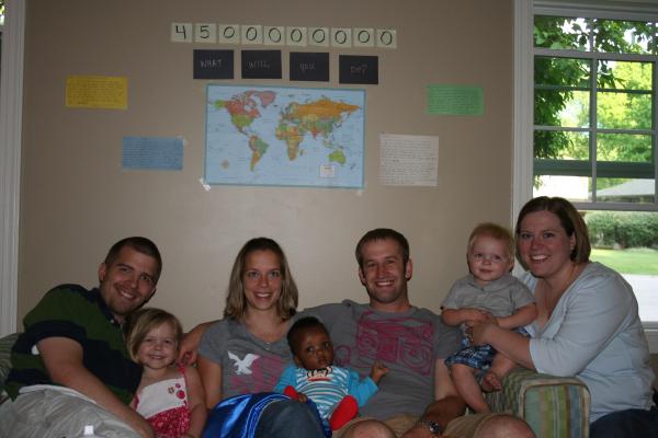 Picture of the wall arrangement, Skidmores and Goodwins sitting on the couch