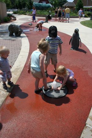 Kids playing in the fountain